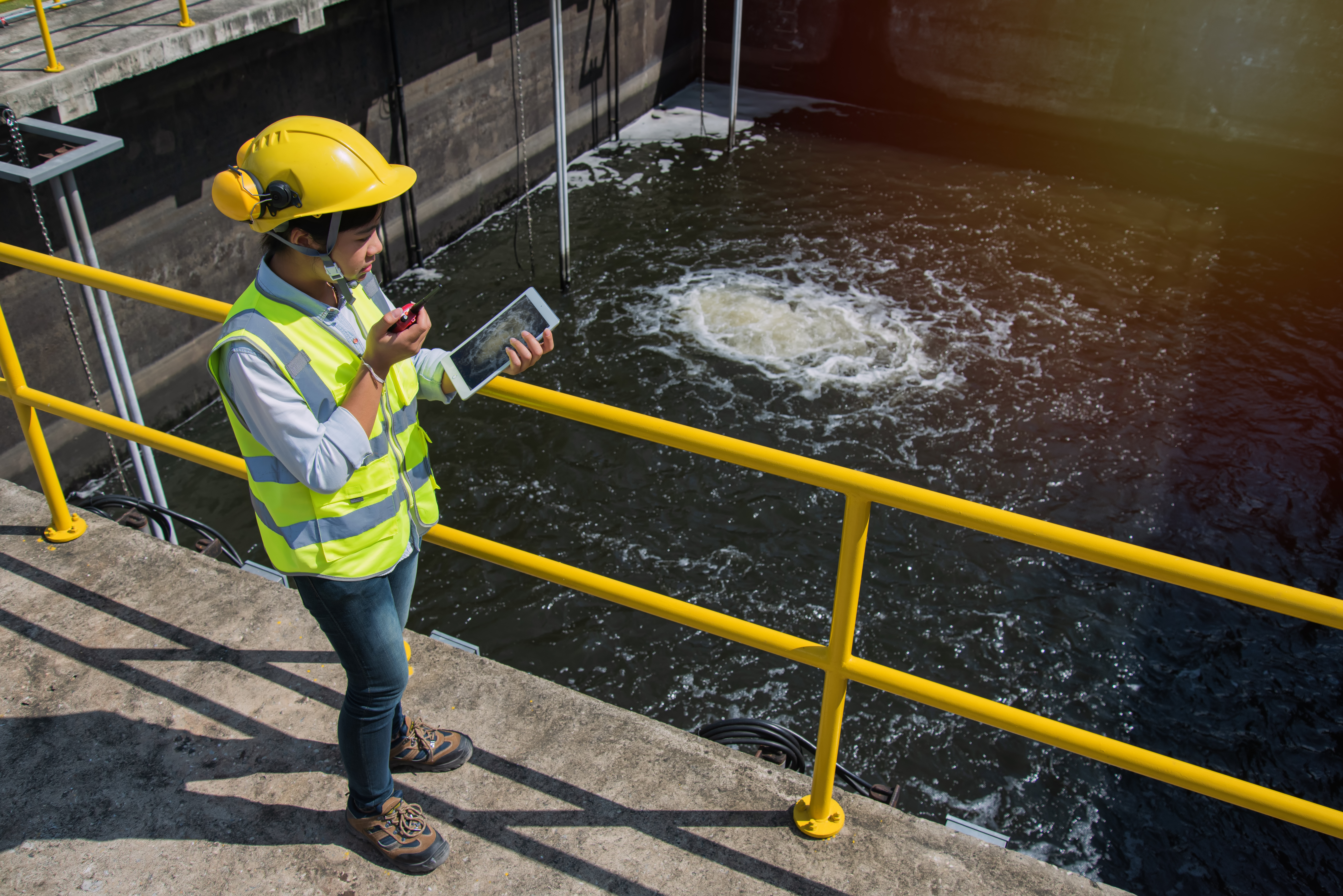 Engineer monitoring wastewater system