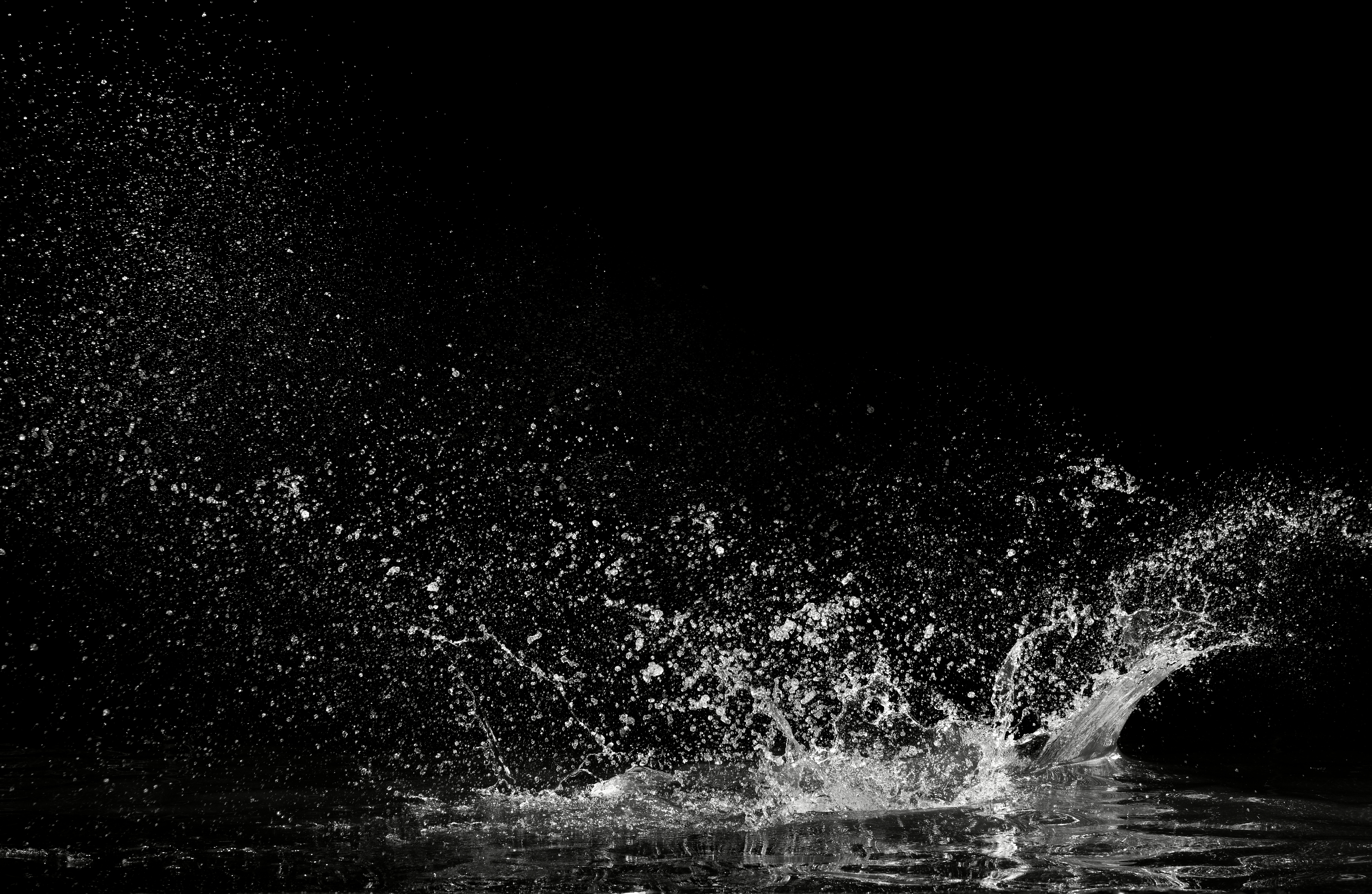 Picture of water splashing against a black background
