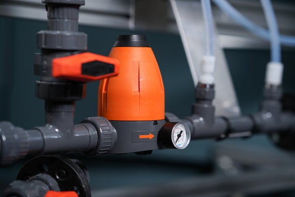 De-bubbler including tubing and pressure relief valves for ScrubberMonitor cabinets